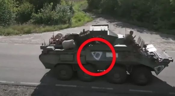 Circle in triangle: Russian troops were first sighted in Ukraine with the symbol at the end of August.
