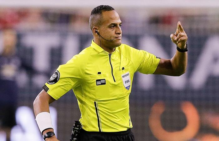 Who is Ismail Elfath, Brazil v Cameroon referee?